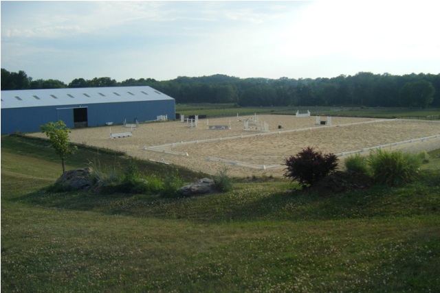 Full size dressage arena and jump course